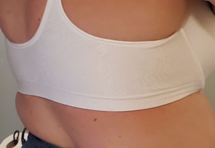 Wearing the supportive Bali back fat bra in a white color