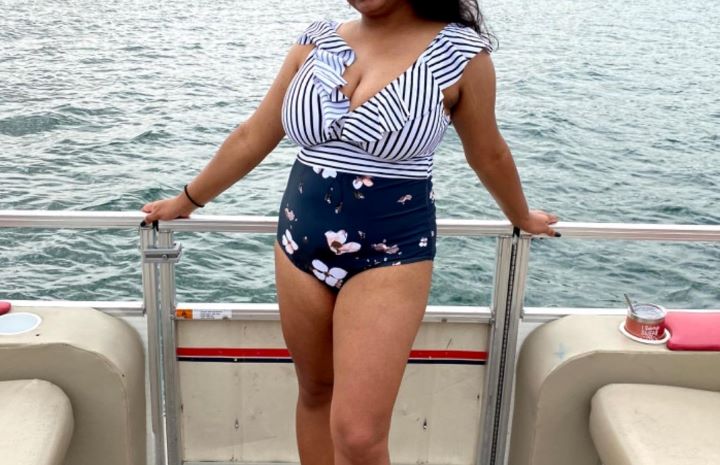 Wearing out the flattering halterneck swimsuit from Cocoship