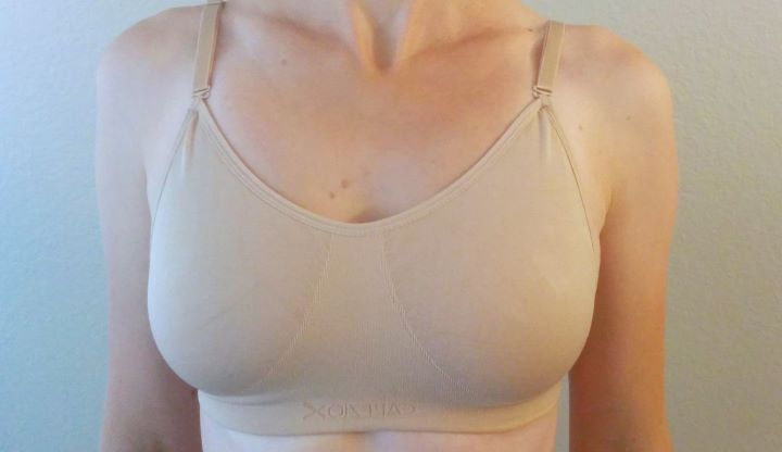 Wearing Seamless Clear Back Bra With Transition Straps from the brand Capezio